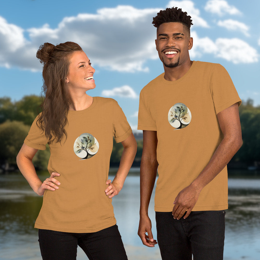 Essence of Nature - Elegant, stylized tree design with fluid curves and semi-transparent leaves in gentle earth-tone colors, set within a circular shape. Two Models with graphic printed on toast-colored Unisex Staple T-Shirt Bella + Canvas 3001