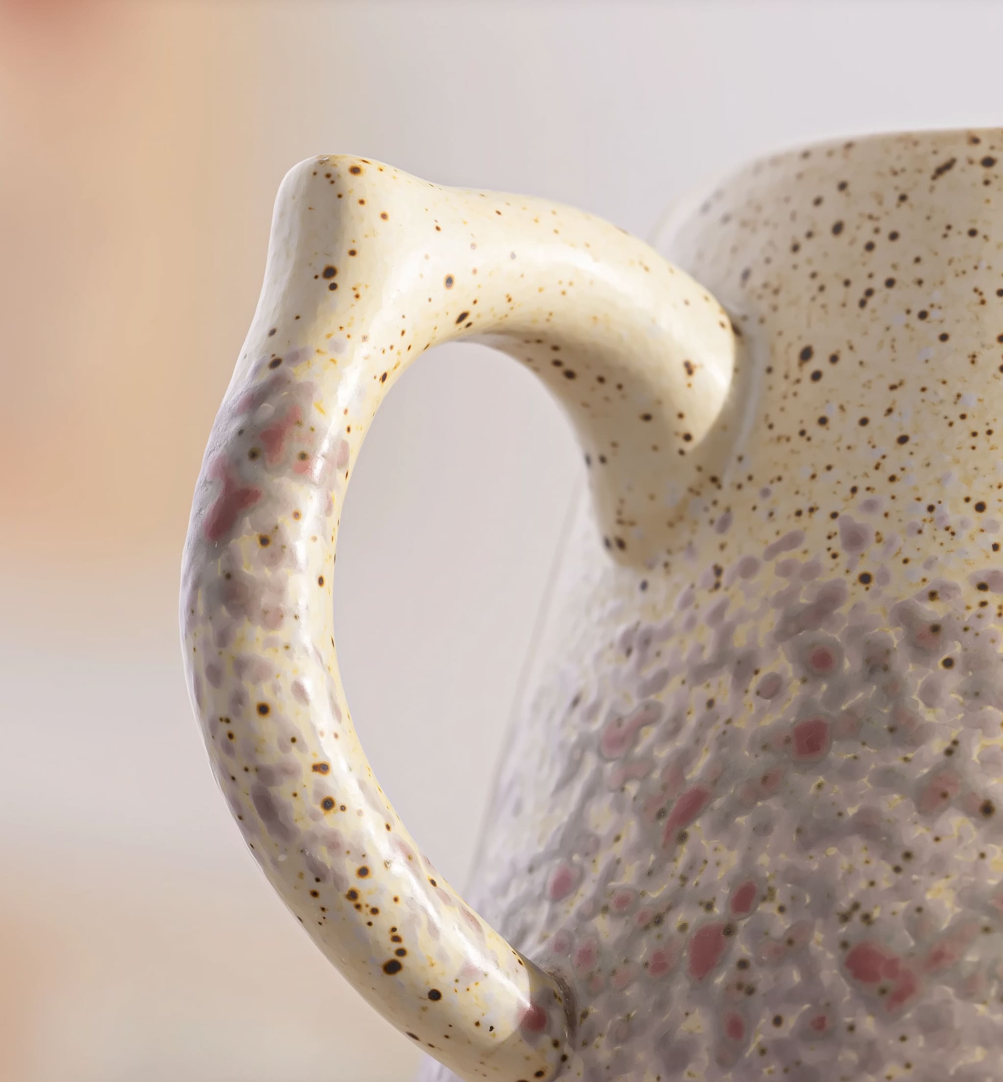 Handcrafted ceramic mug showing kiln-fired texture close-up