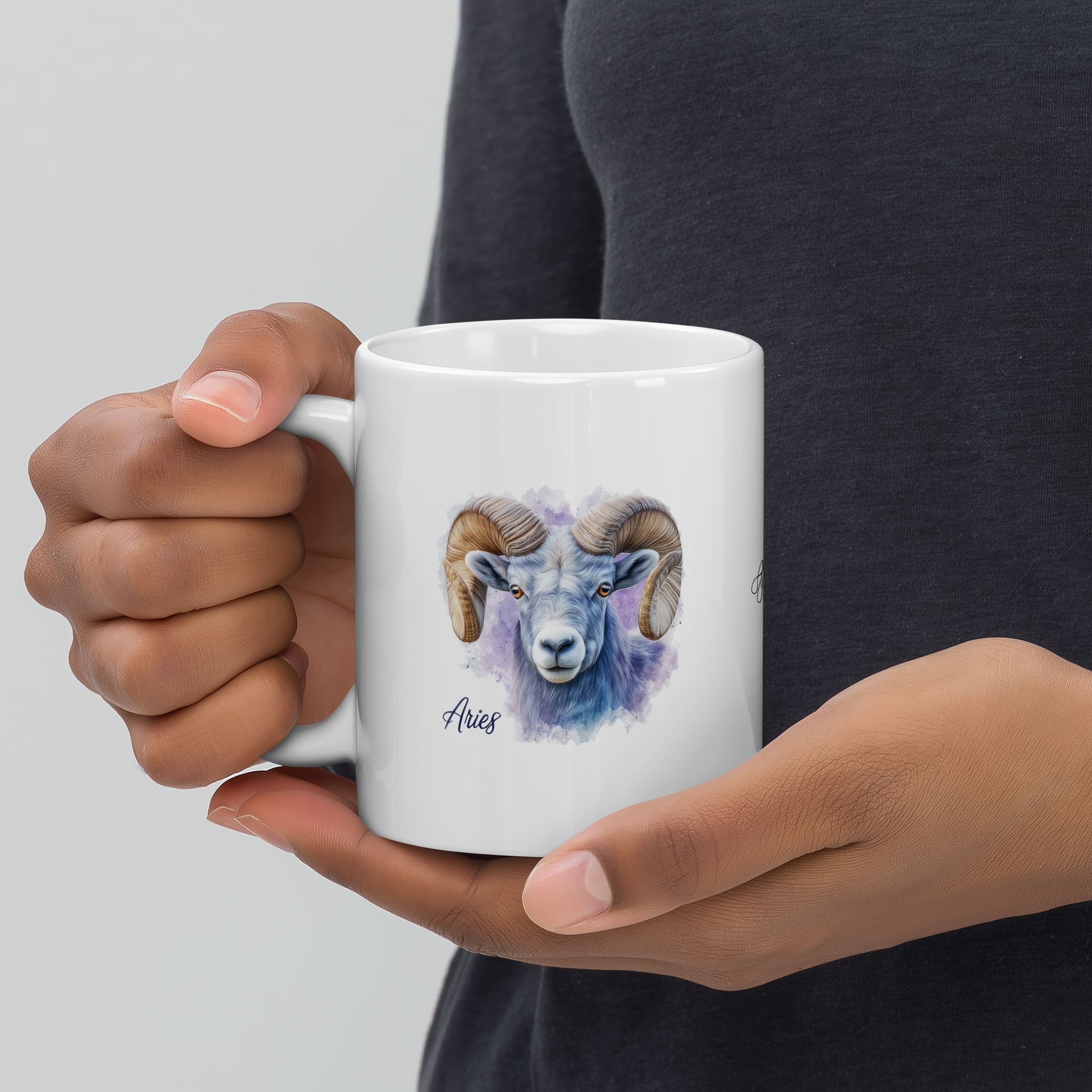 A stylized ceramic mug with a bold Aries symbol on it. It hints at a thoughtful lifestyle choice reflecting the user's zodiac sign