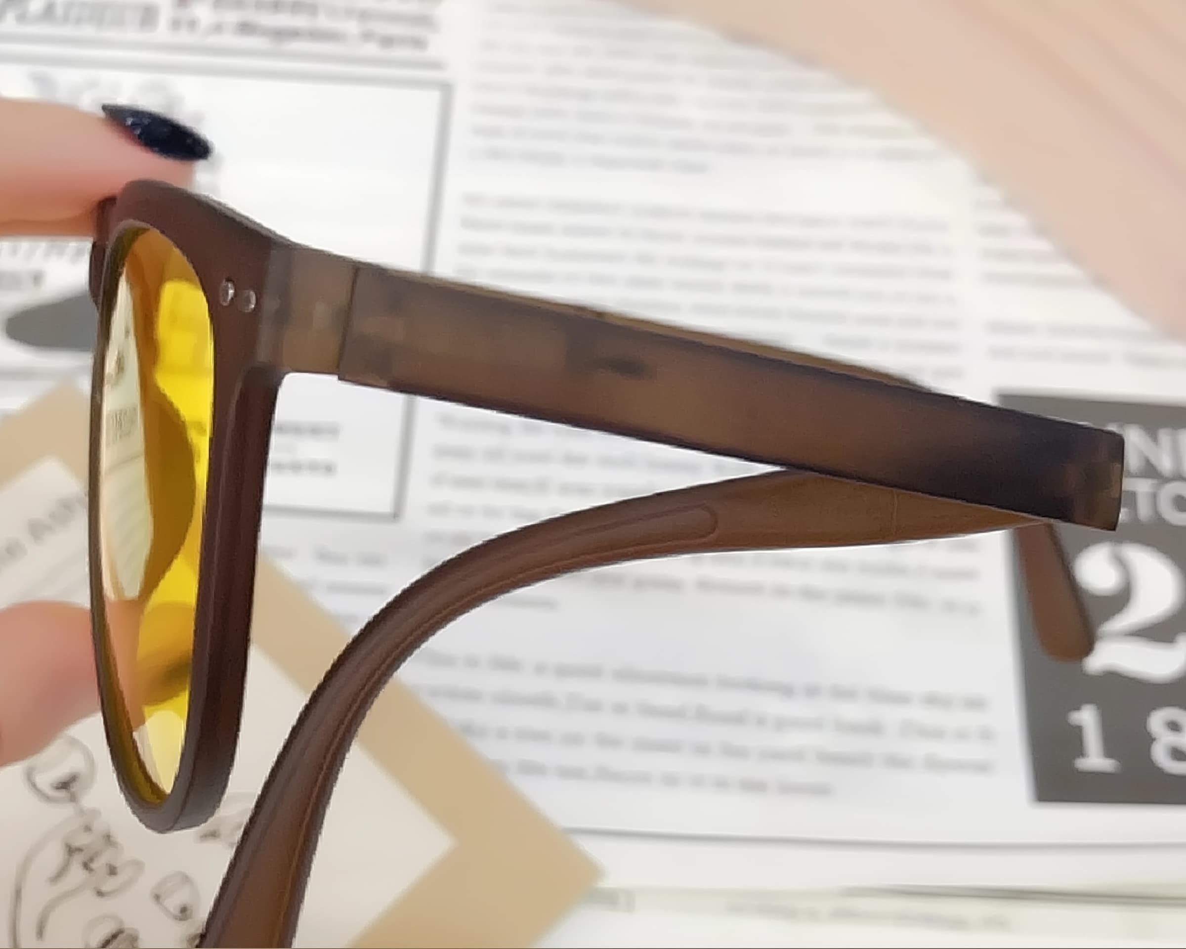 Folded polarized sunglasses seen from the side