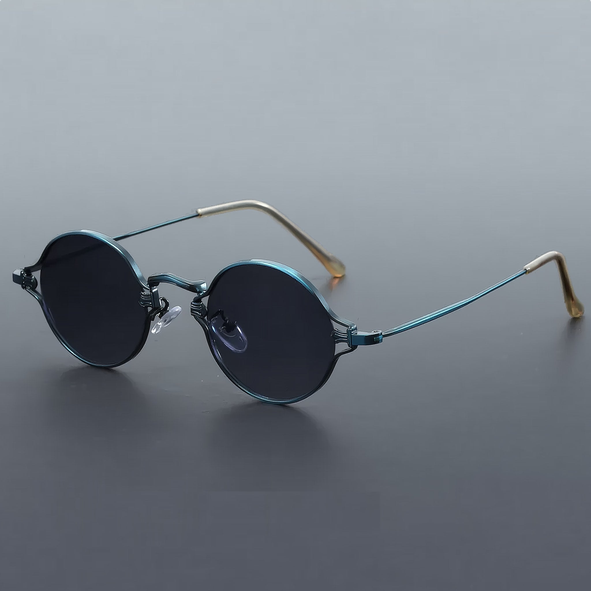 Vintage style round sunglasses with blue frame and gray lenses
