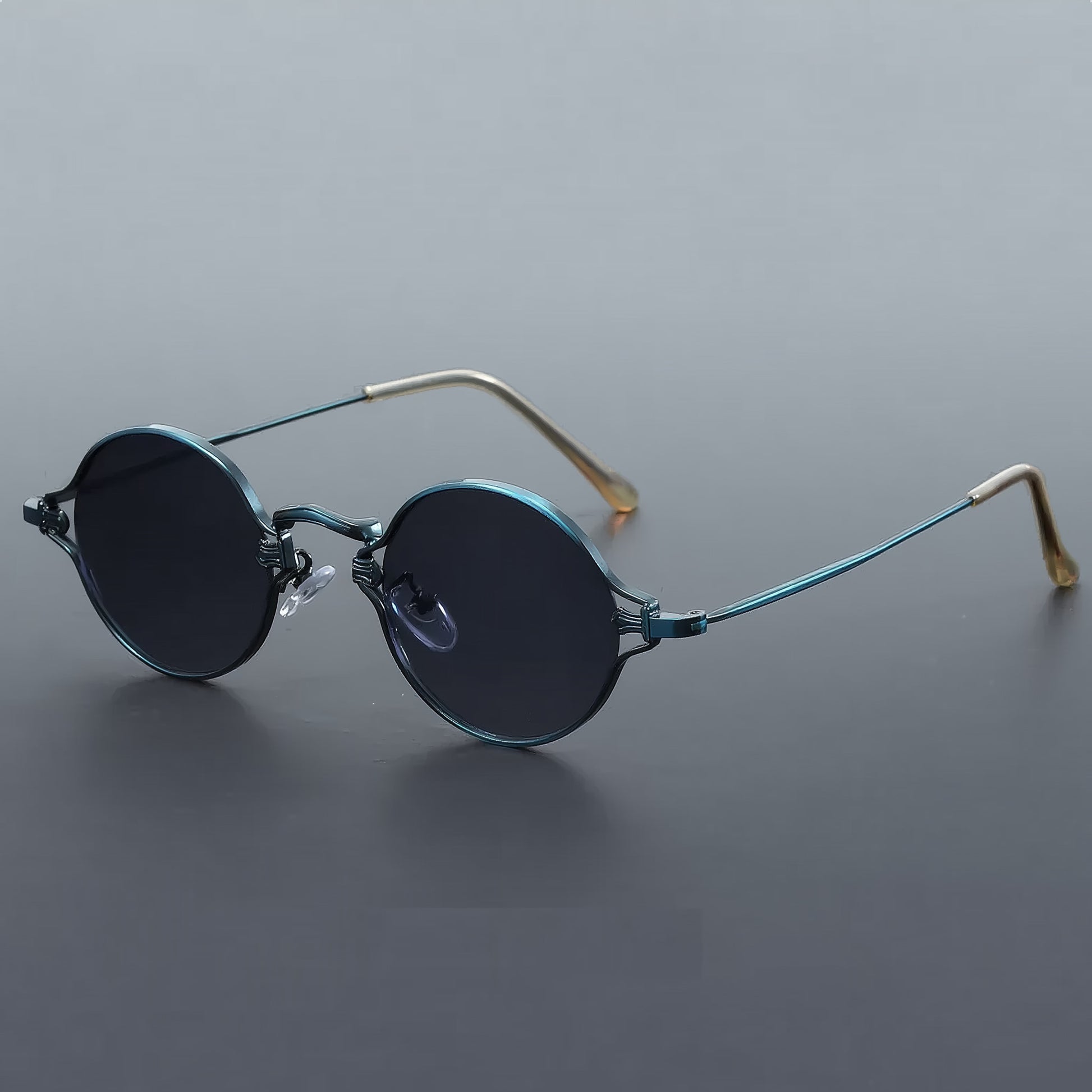 Vintage style round sunglasses with blue frame and gray lenses