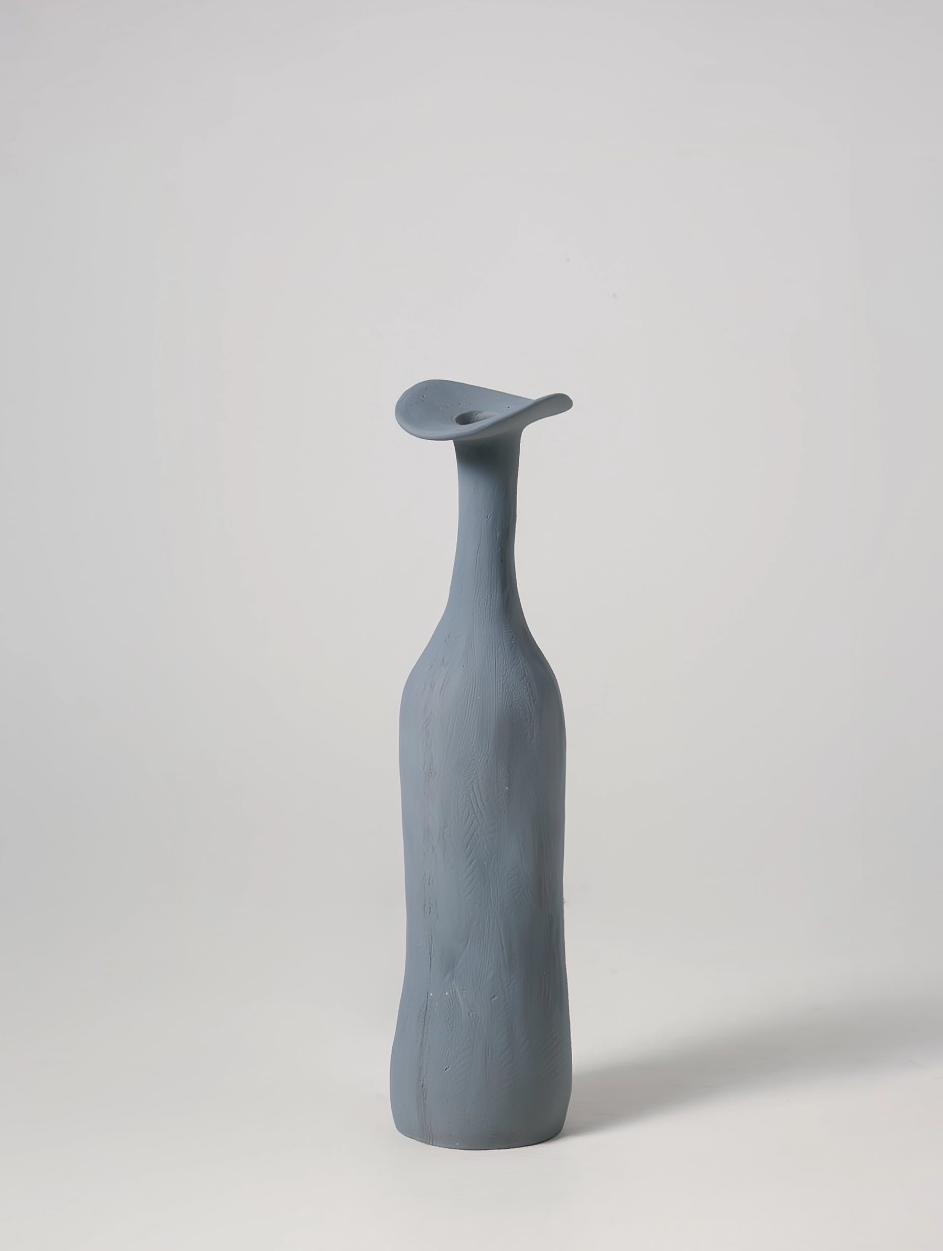 Morandi ceramic vase in blue on neutral background