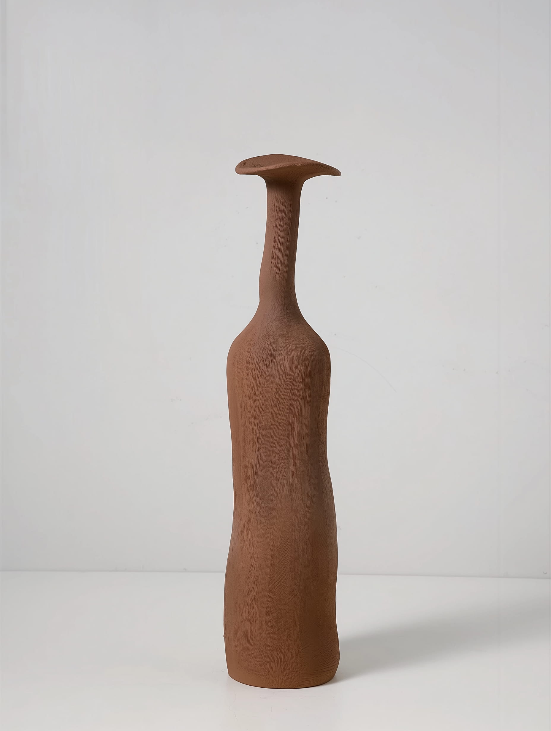 Morandi ceramic vase in brown on neutral background