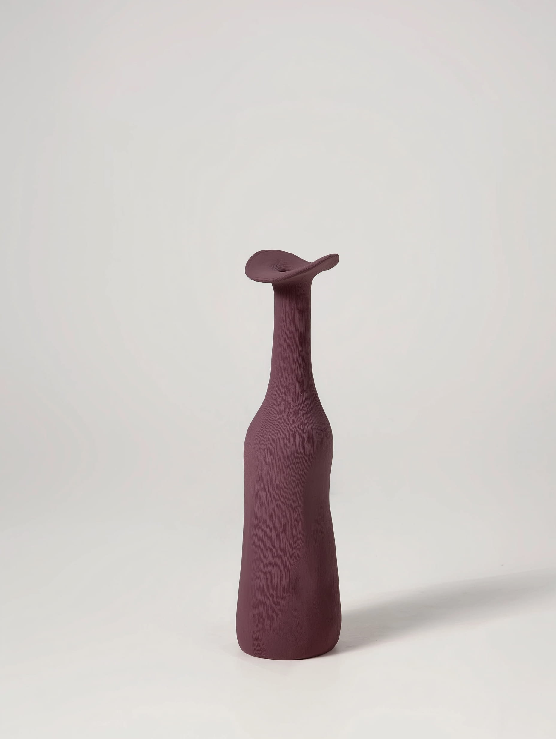 Morandi ceramic vase in red on neutral background
