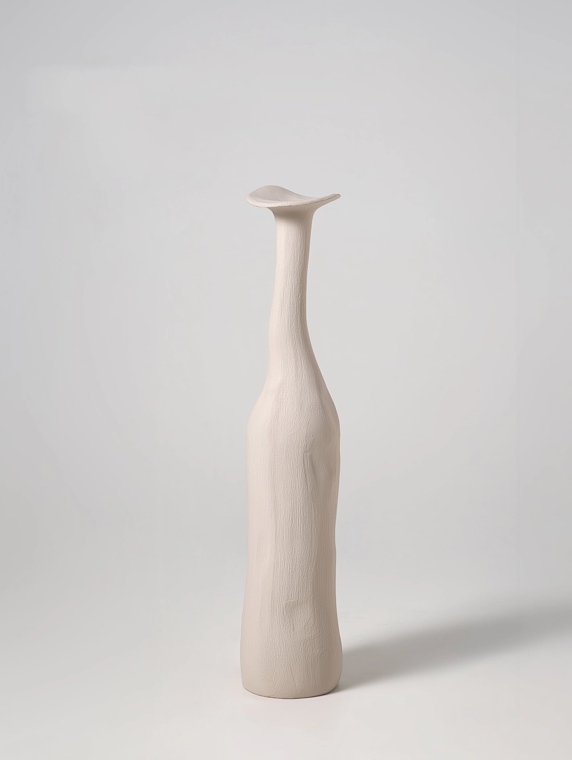 Morandi ceramic vase in white on neutral background